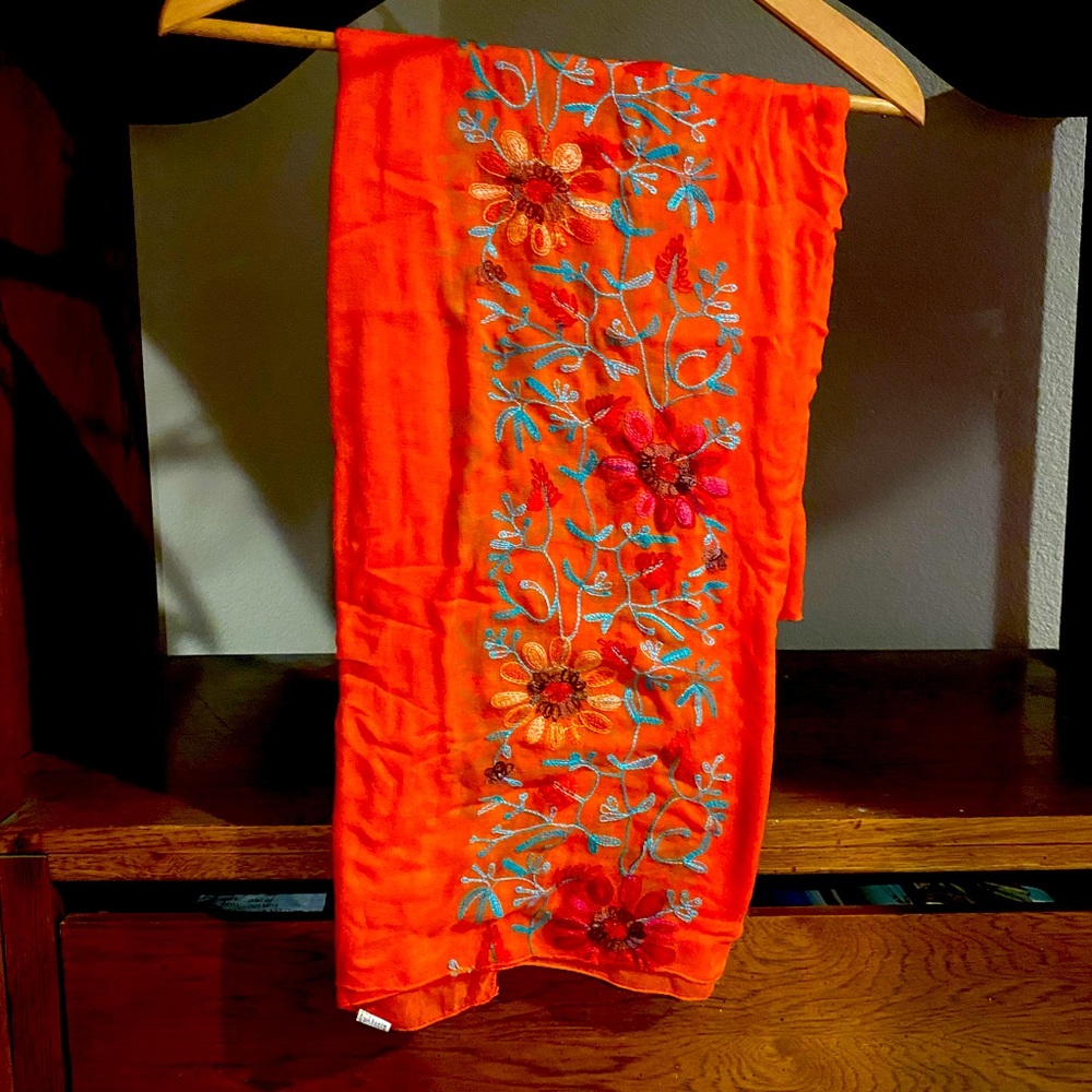 orange scarf with embroidered flowers